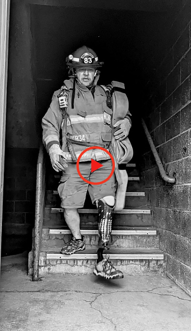 Play Button-Rural Firefighter with Prosthetic Leg